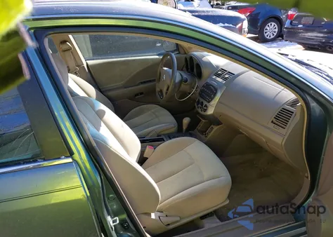 2002 Nissan Altima Base из США, поврежденный, VIN 1N4AL11D62C701569